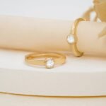 Solid Gold Diamond Bezel Huggies - Image 4