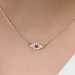 18k Solid Gold Diamond and Ruby Evil Eye Necklace - Image 3